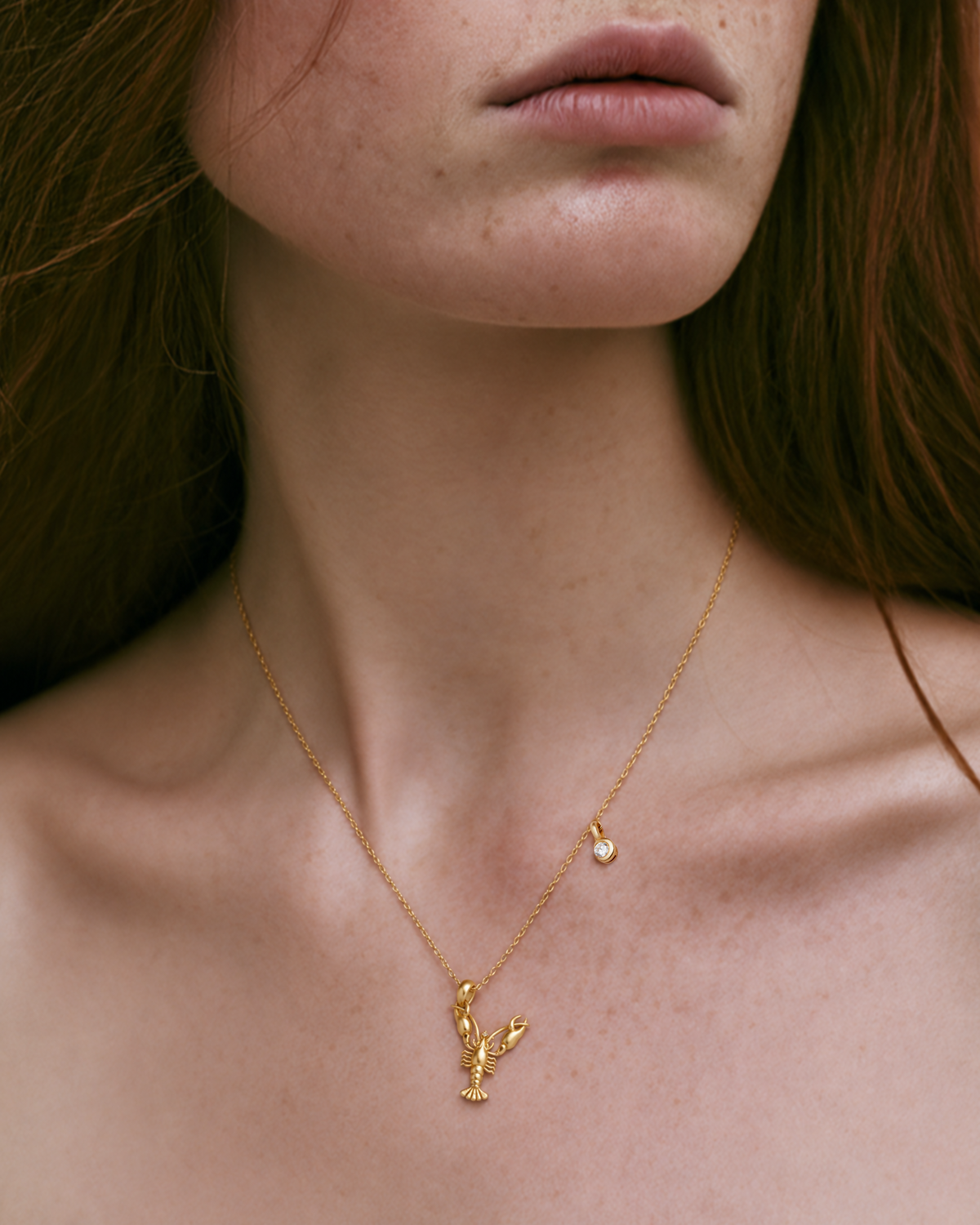 Model wearing the gold Y initial necklace